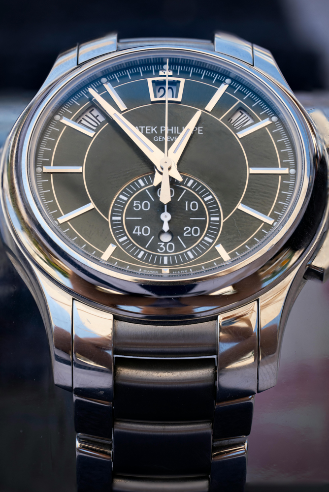 Patek Philippe Nautilus with blue dial resting on denim fabric